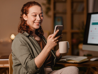 Woman using her mobile device